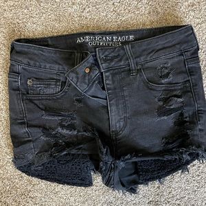 Black ripped jean shorts